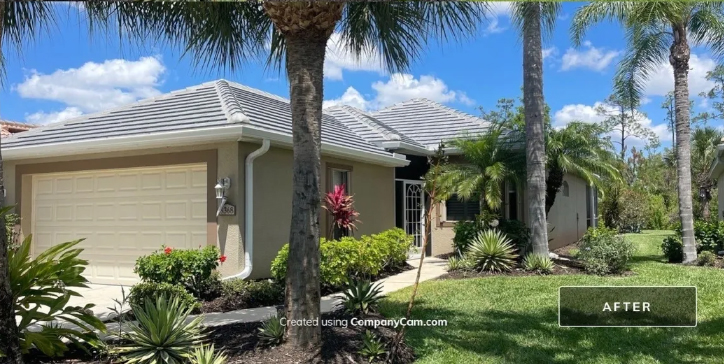 After photo: completed tile roof renovation with excellent integration with landscape features