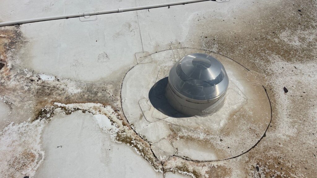 Large commercial complex with multiple roof systems - aerial view