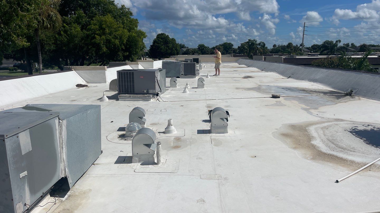 Flat roof equipment installation work in progress