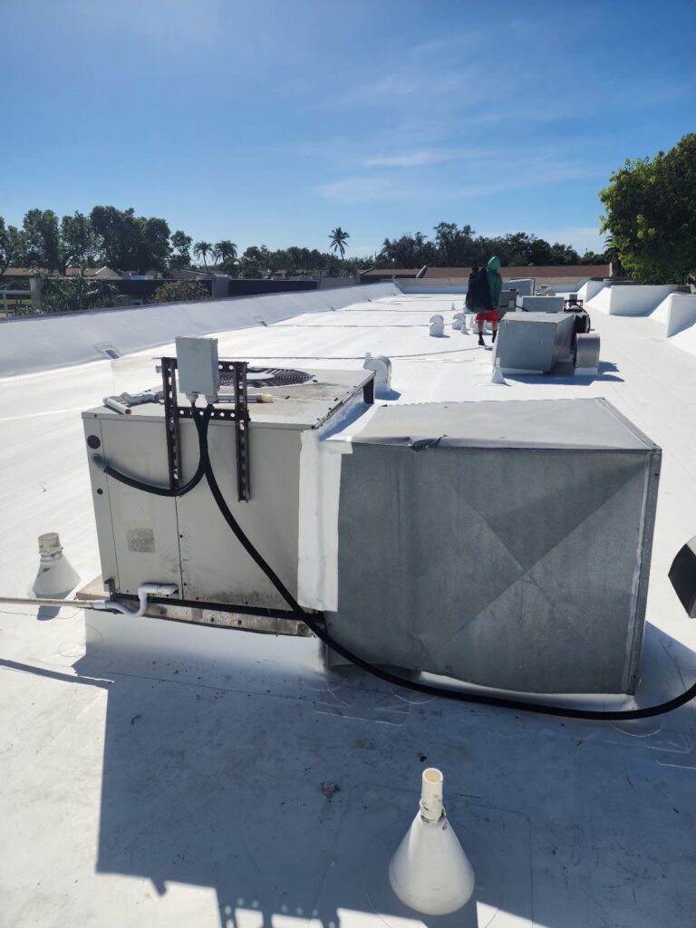 Multiple HVAC units installation with professional worker
