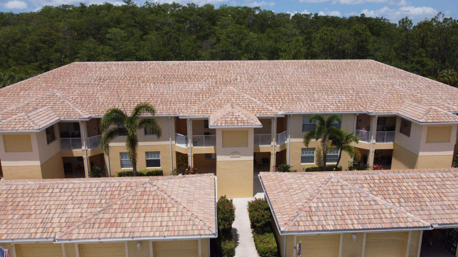 Residential complex tile roof aerial showing multi-unit expertise