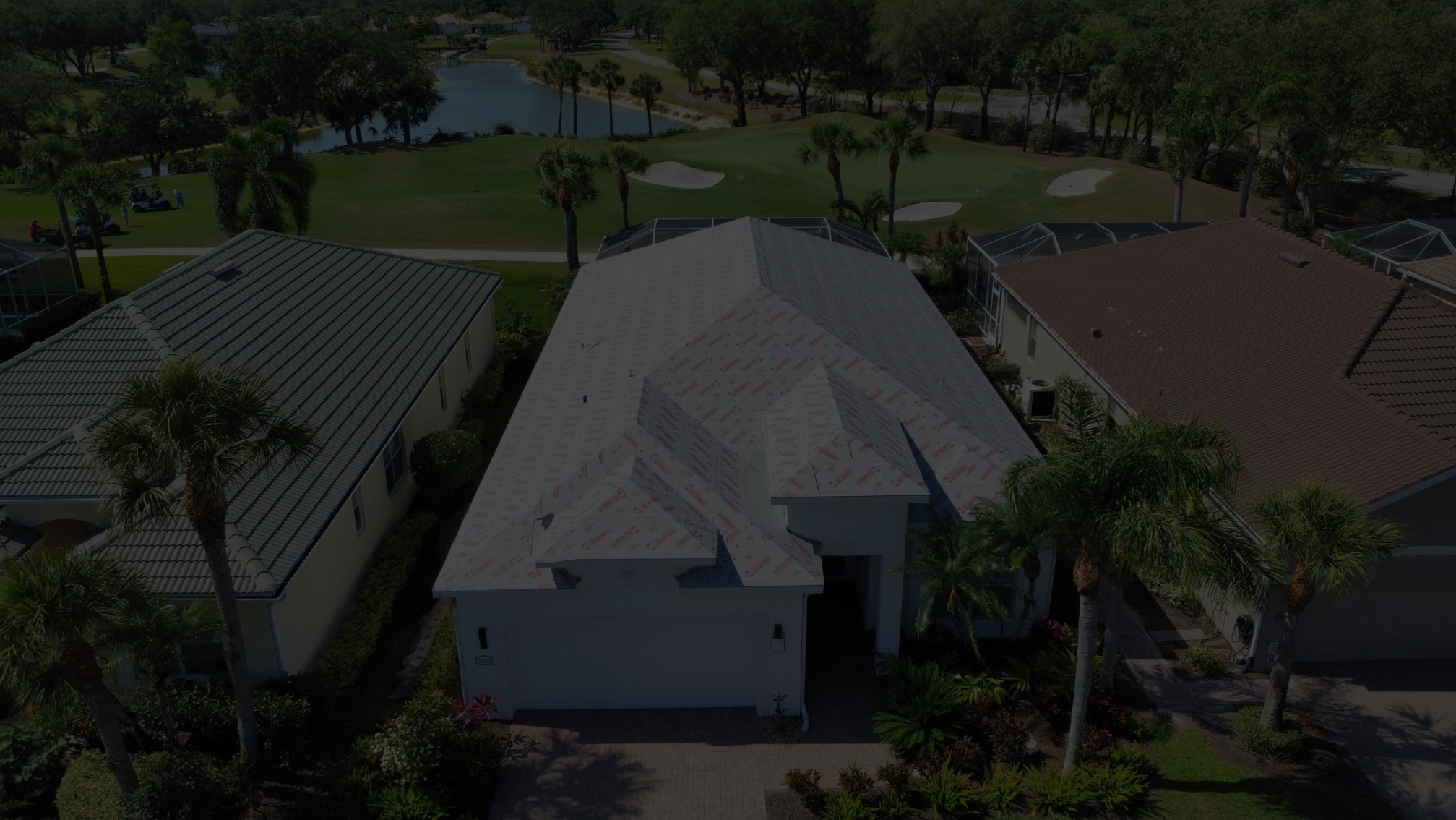 Golf community residential roofs aerial showing luxury community work