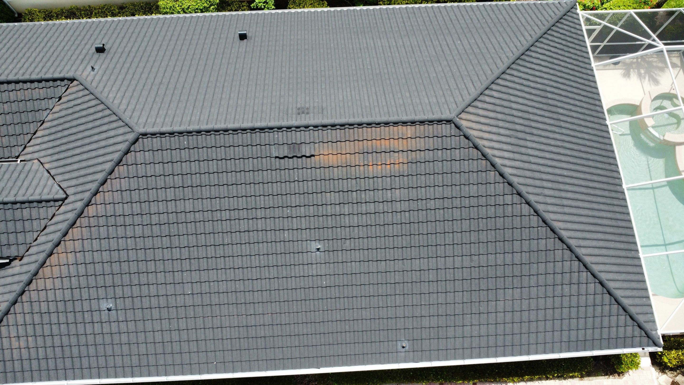 Diverse roofing materials and colors aerial view showing versatility