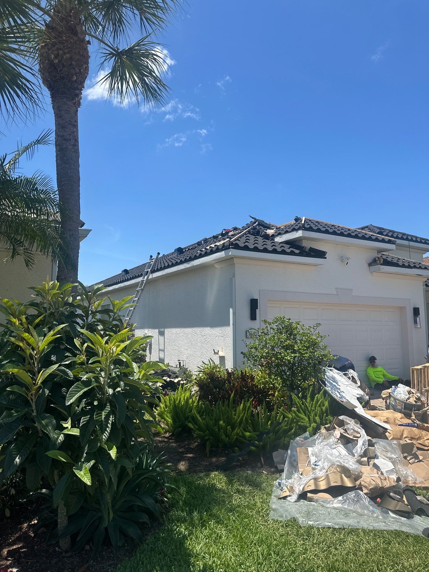 Roofing installation completion aerial view showing finished quality work