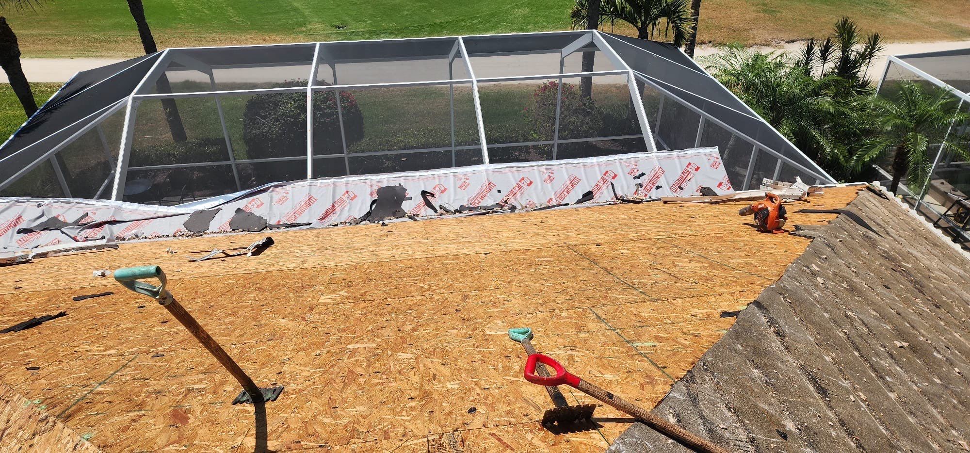 Roof work completion aerial view showing finished professional results