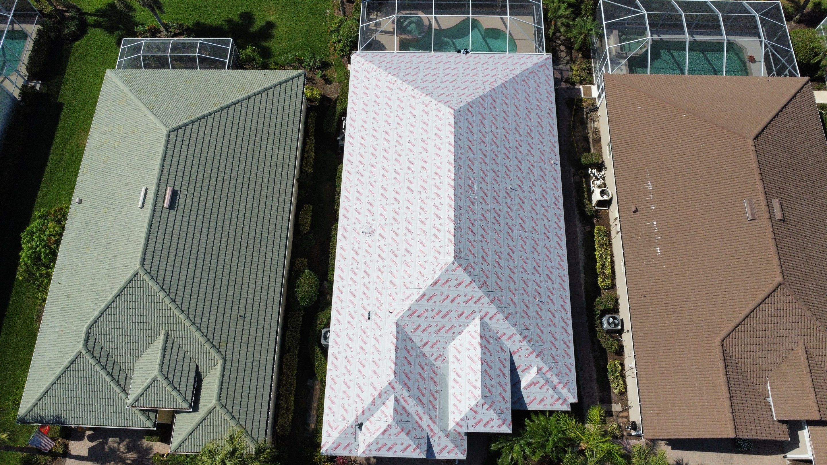Three completed roofs aerial view showing consistent quality
